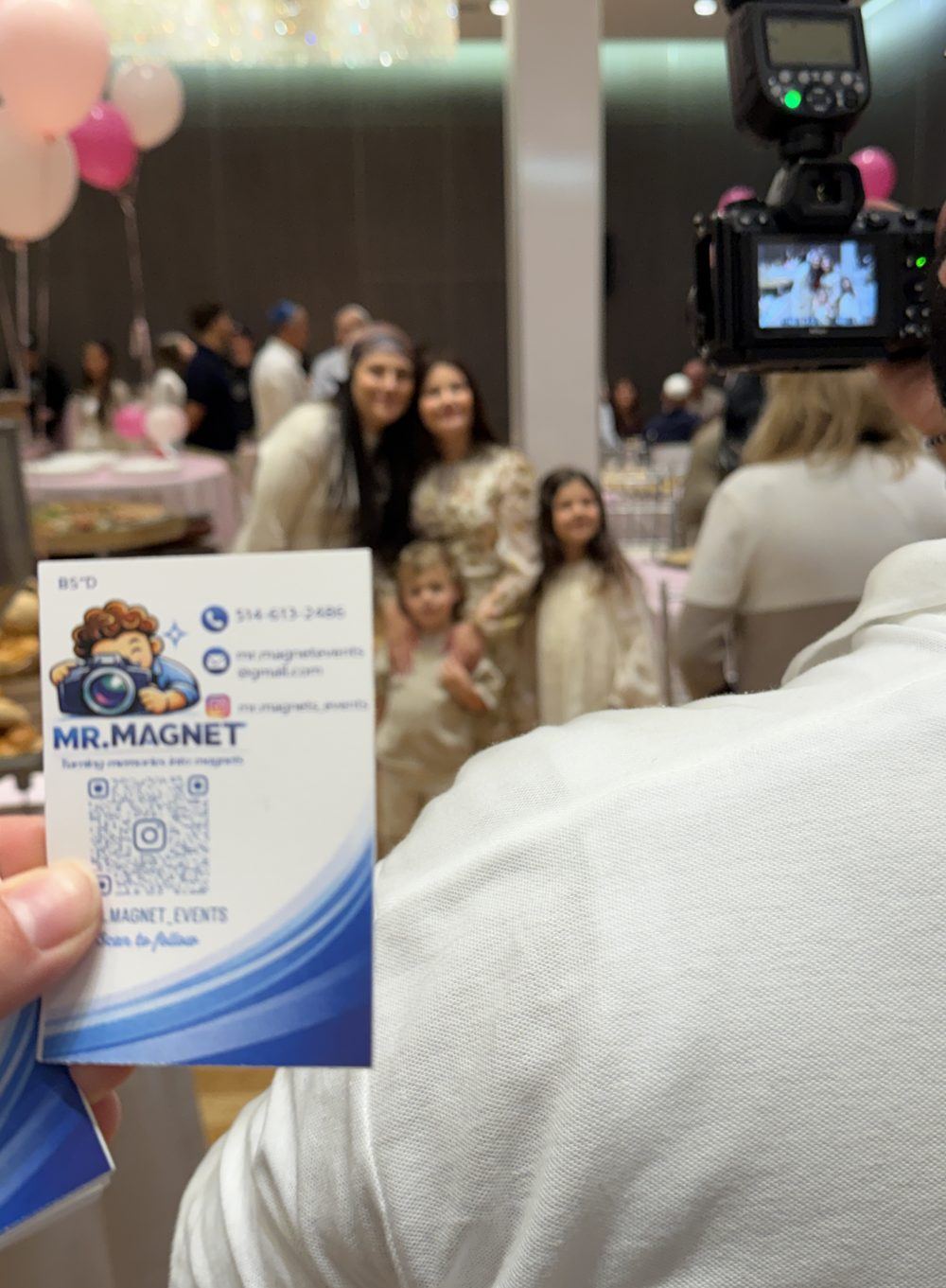 Mr. Magnet photographer capturing a candid moment with guests at a Montreal event